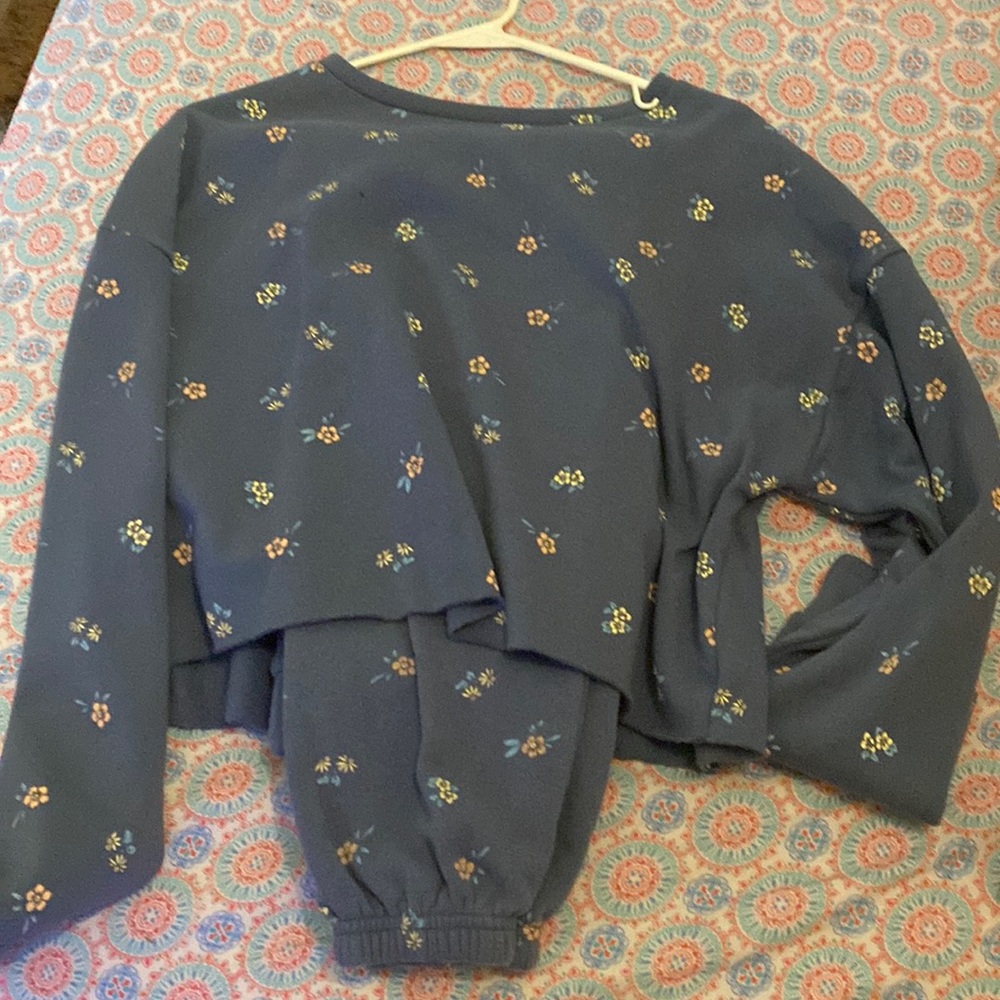 Top and bottoms together it dark blue with flowers
